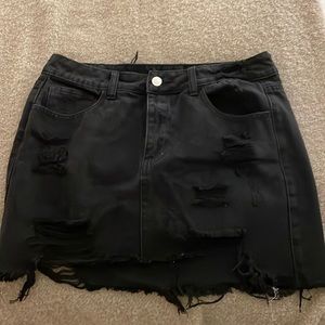Thrifted deconstructed black denim skirt